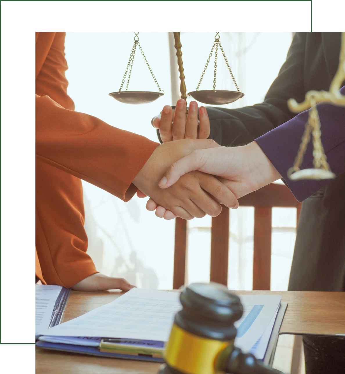 Business agreement with justice scales symbol