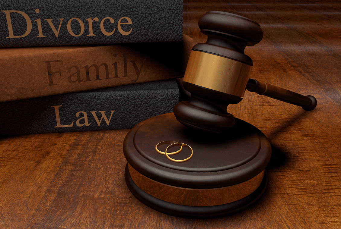 Gavel and law books on table