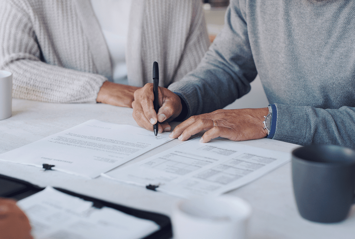 People reviewing paperwork together